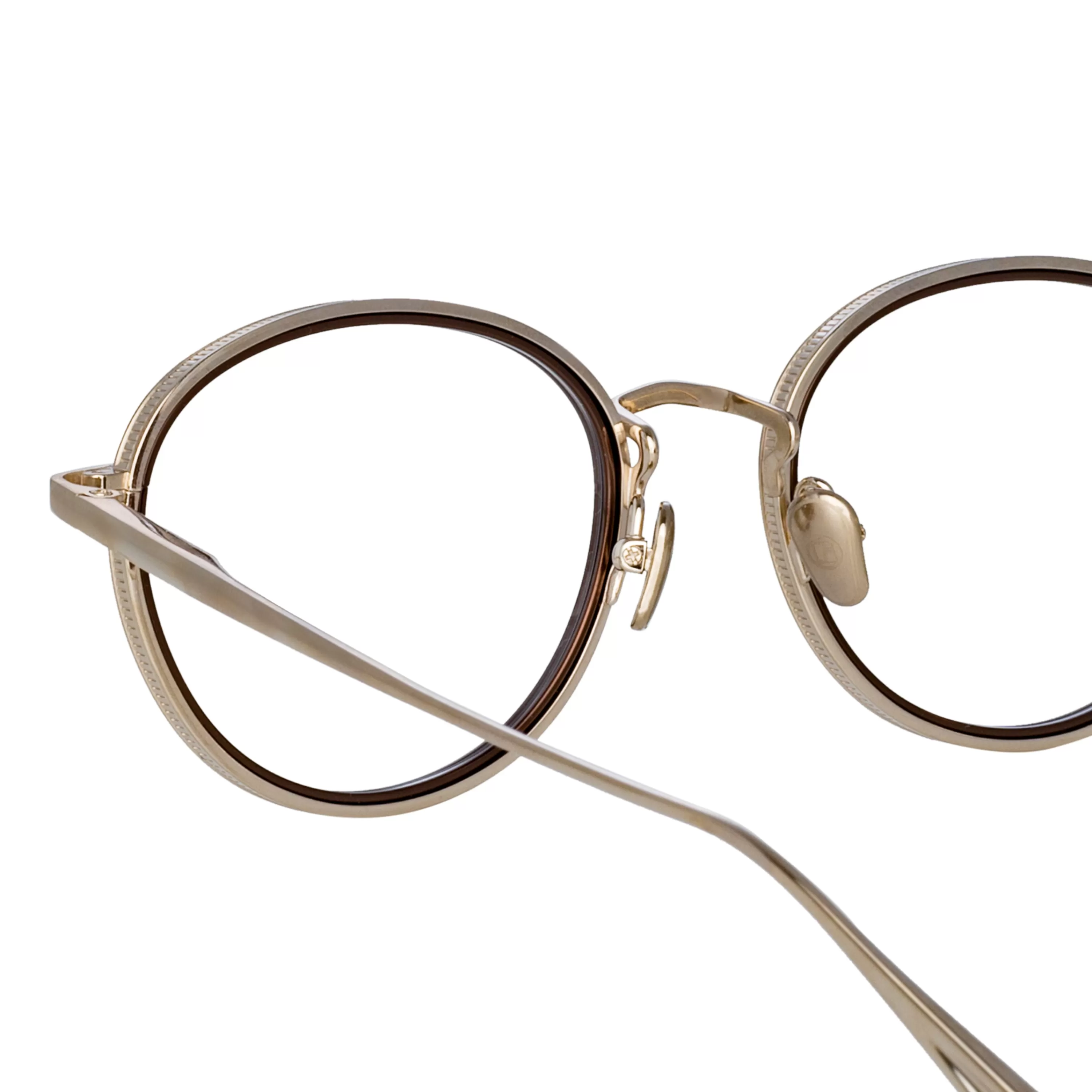 moss_oval_optical_frame_in_light_gold_3.webp LINDA FARROW (U.K.) Moss Oval Optical Frame in Light Gold